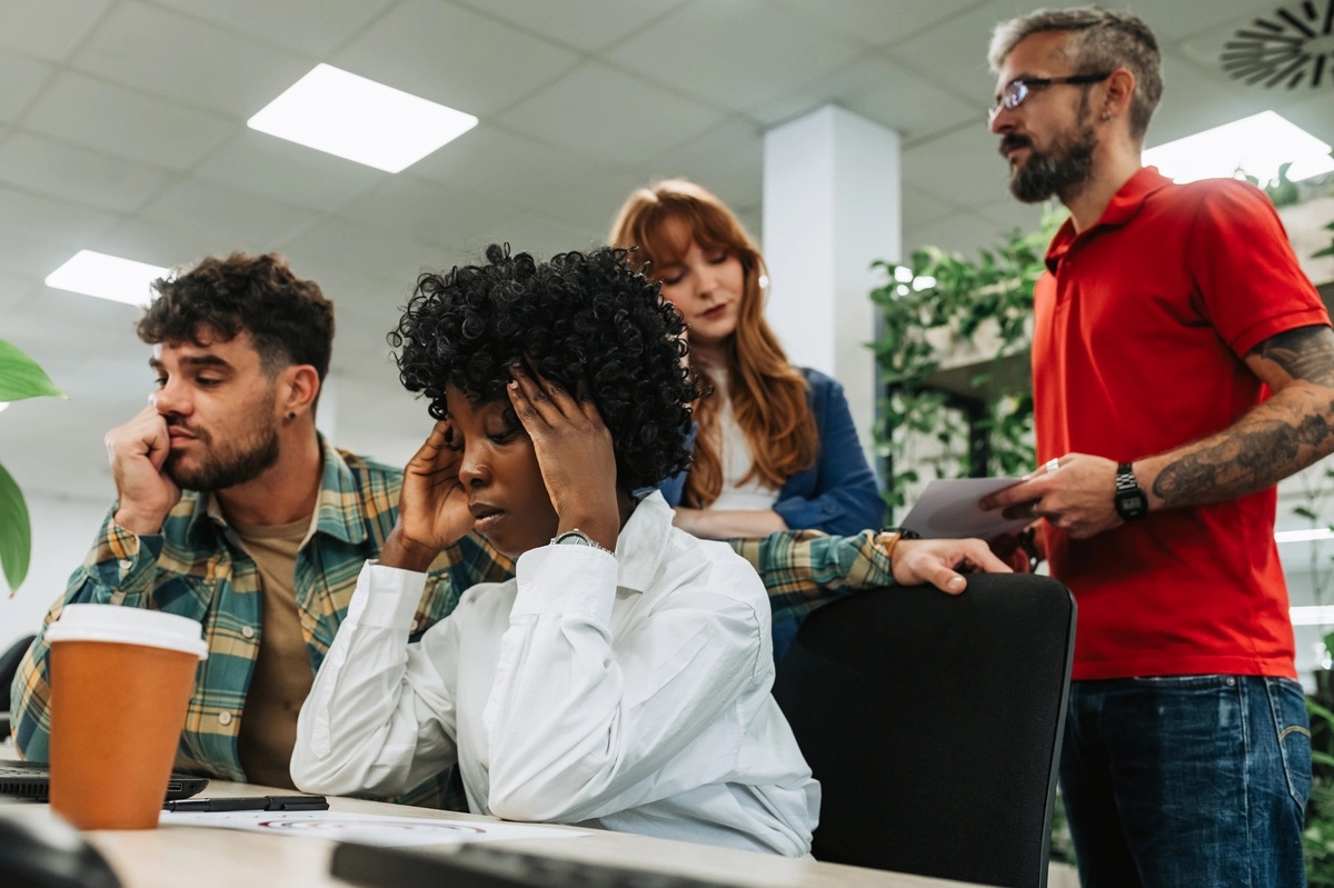 A woman struggling with GAD symptoms in a social setting. 