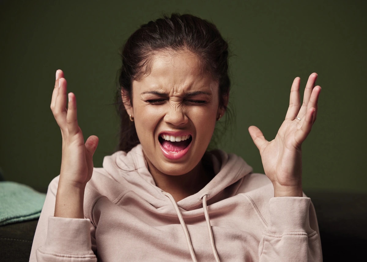 A child having a temper outburst, characteristic of disruptive mood dysregulation disorder.