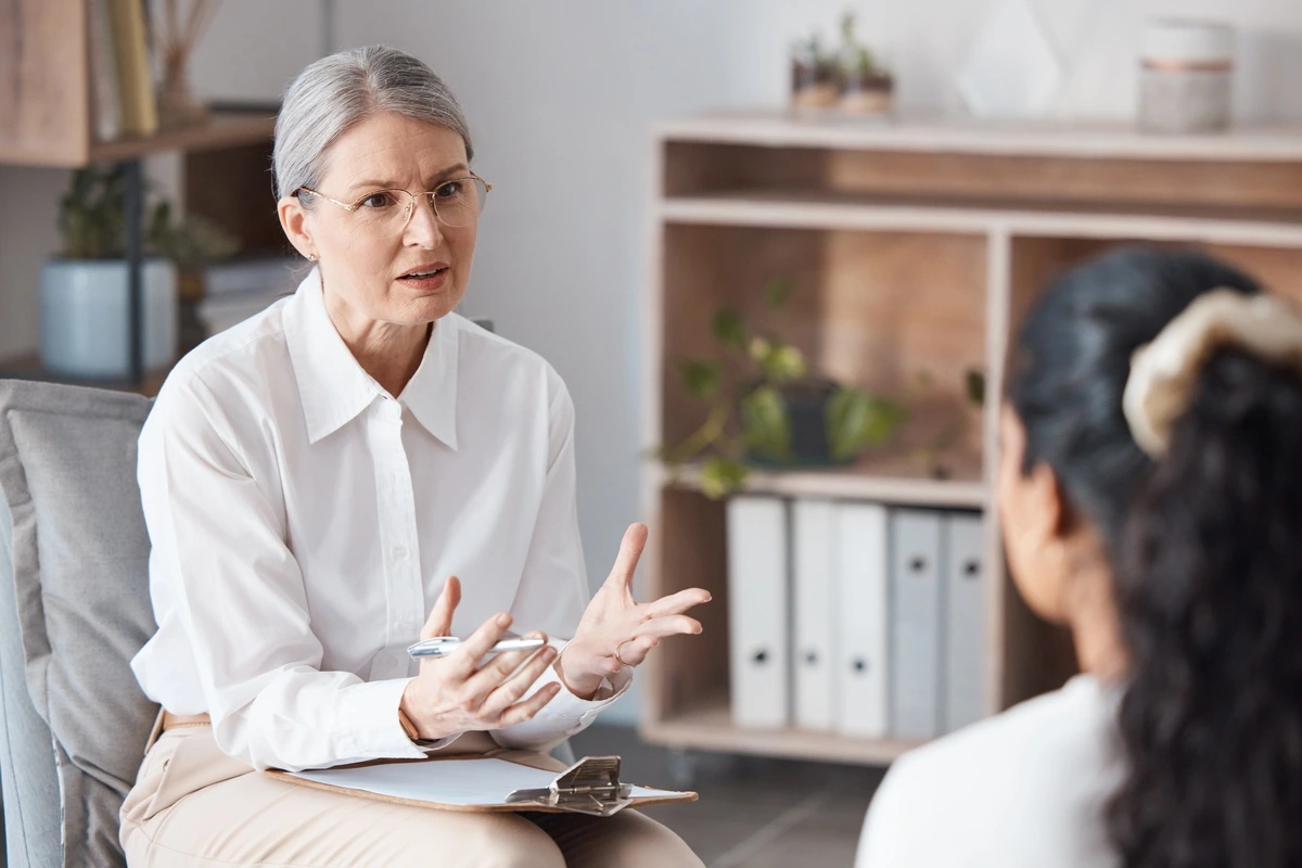 A therapist working with a patient to overcome the challenges of panic disorder.