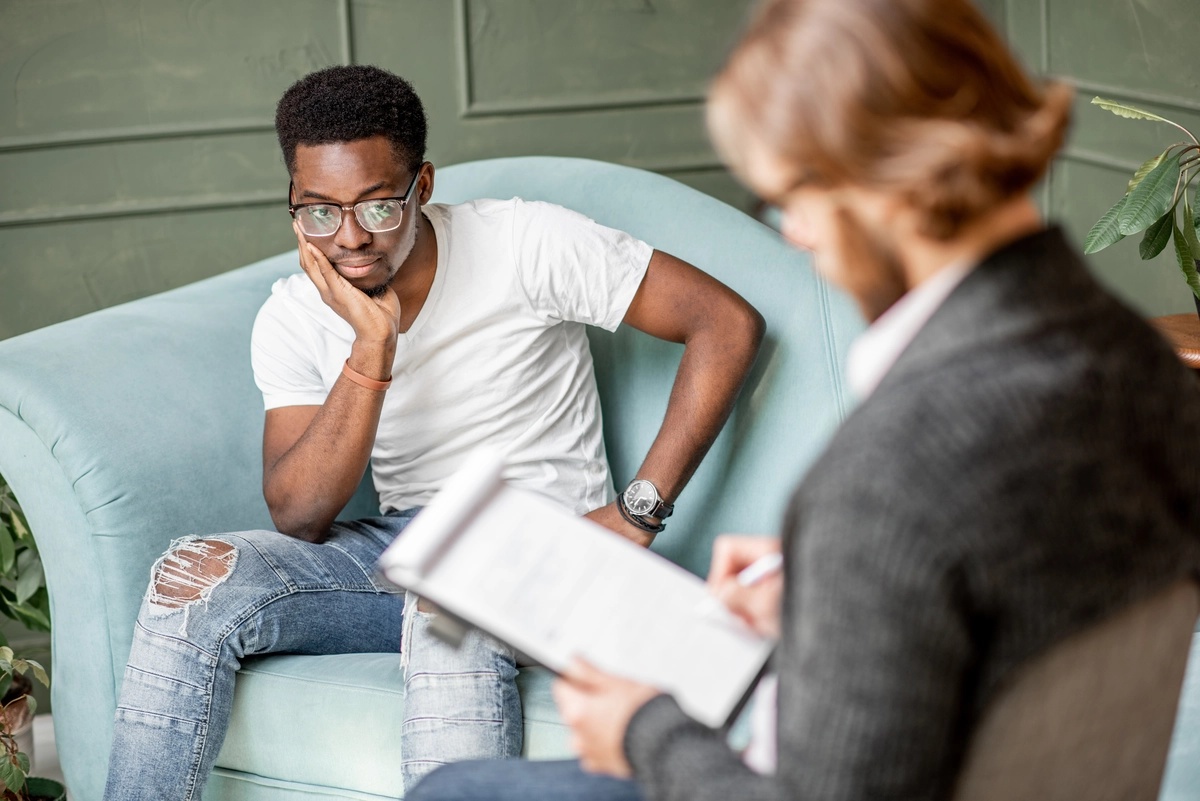 A man in an individual therapy session with his therapist.