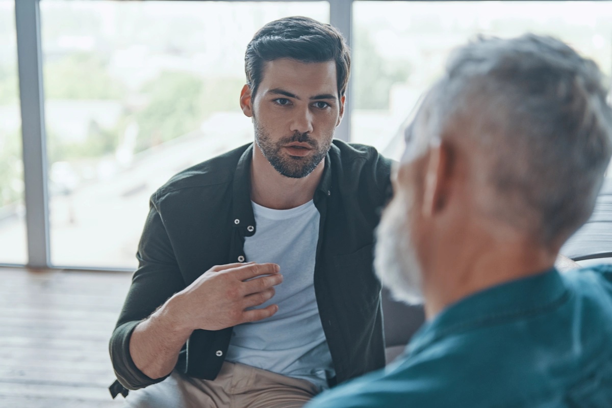 A man talking with his therapist.