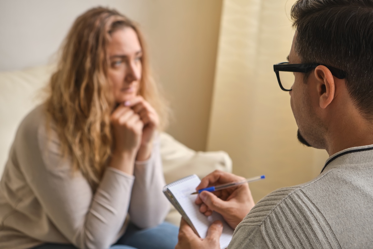 A woman sitting in on a CBT session with her therapist.