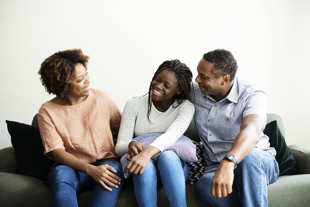 A happy family experiencing the benefits of family therapy.