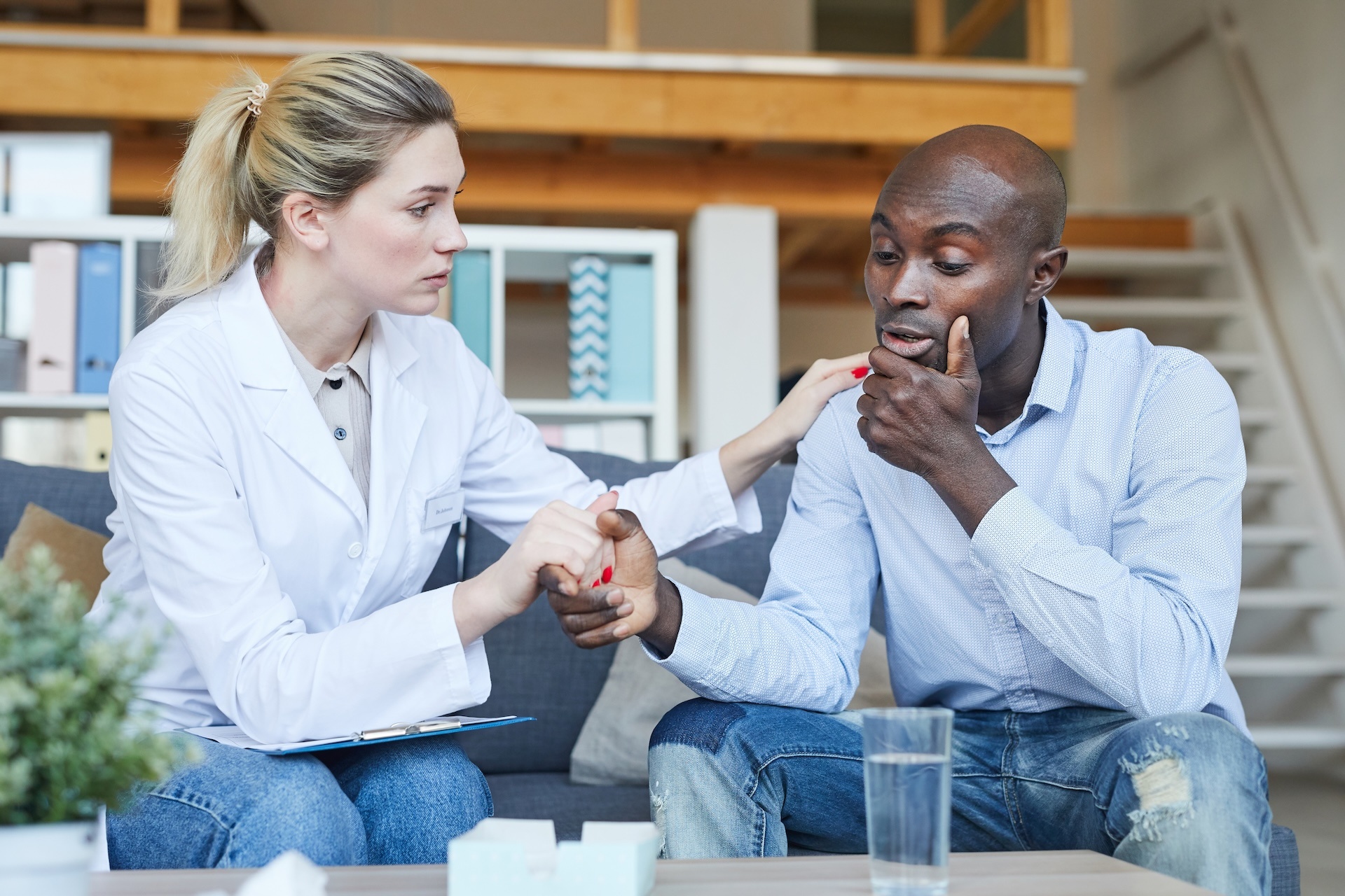therapist-supporting-patient-at-psychology-session-2023-11-27-04-55-00-utc
