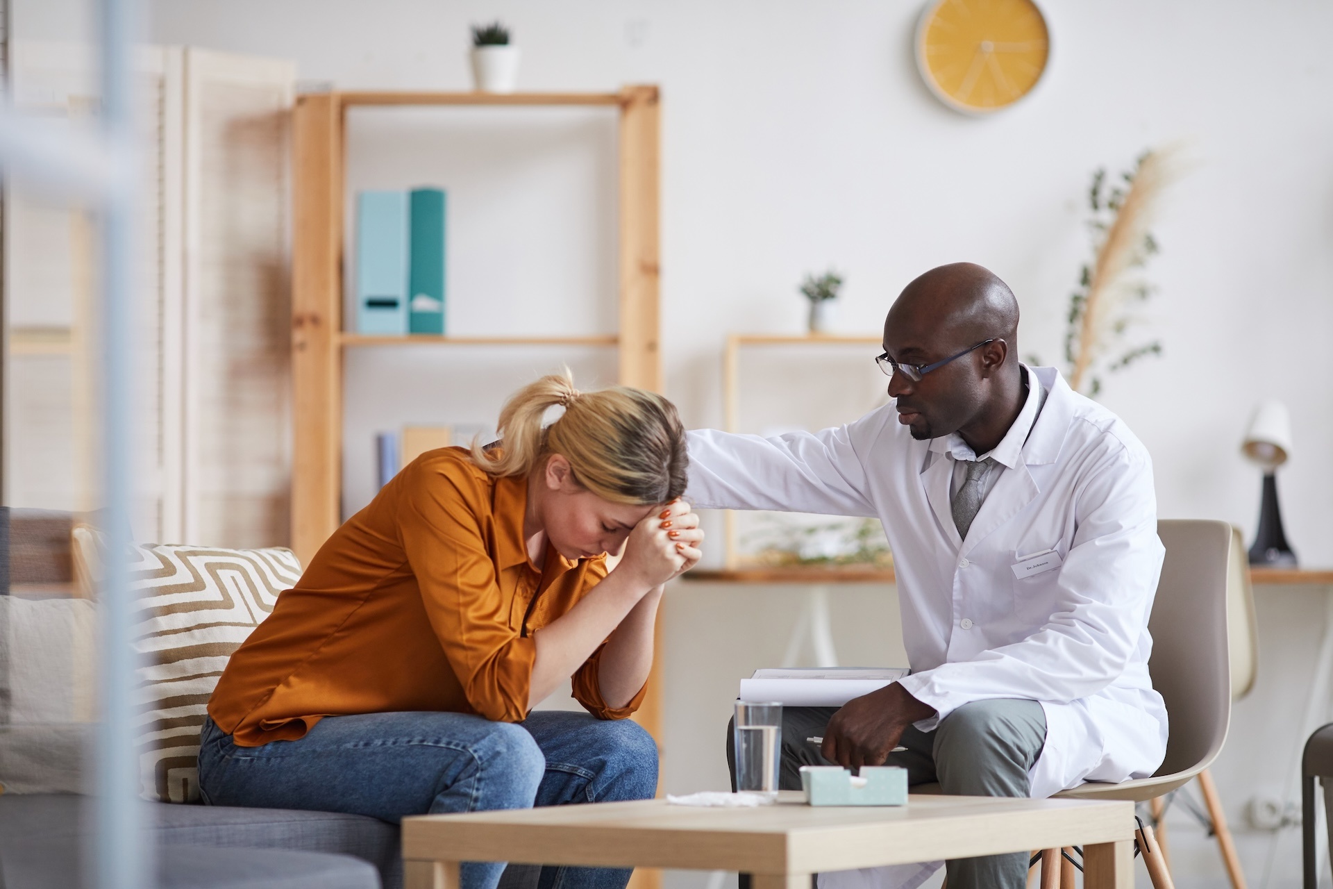 understanding-psychiatrist-consoling-crying-patien-2025-03-18-22-20-34-utc