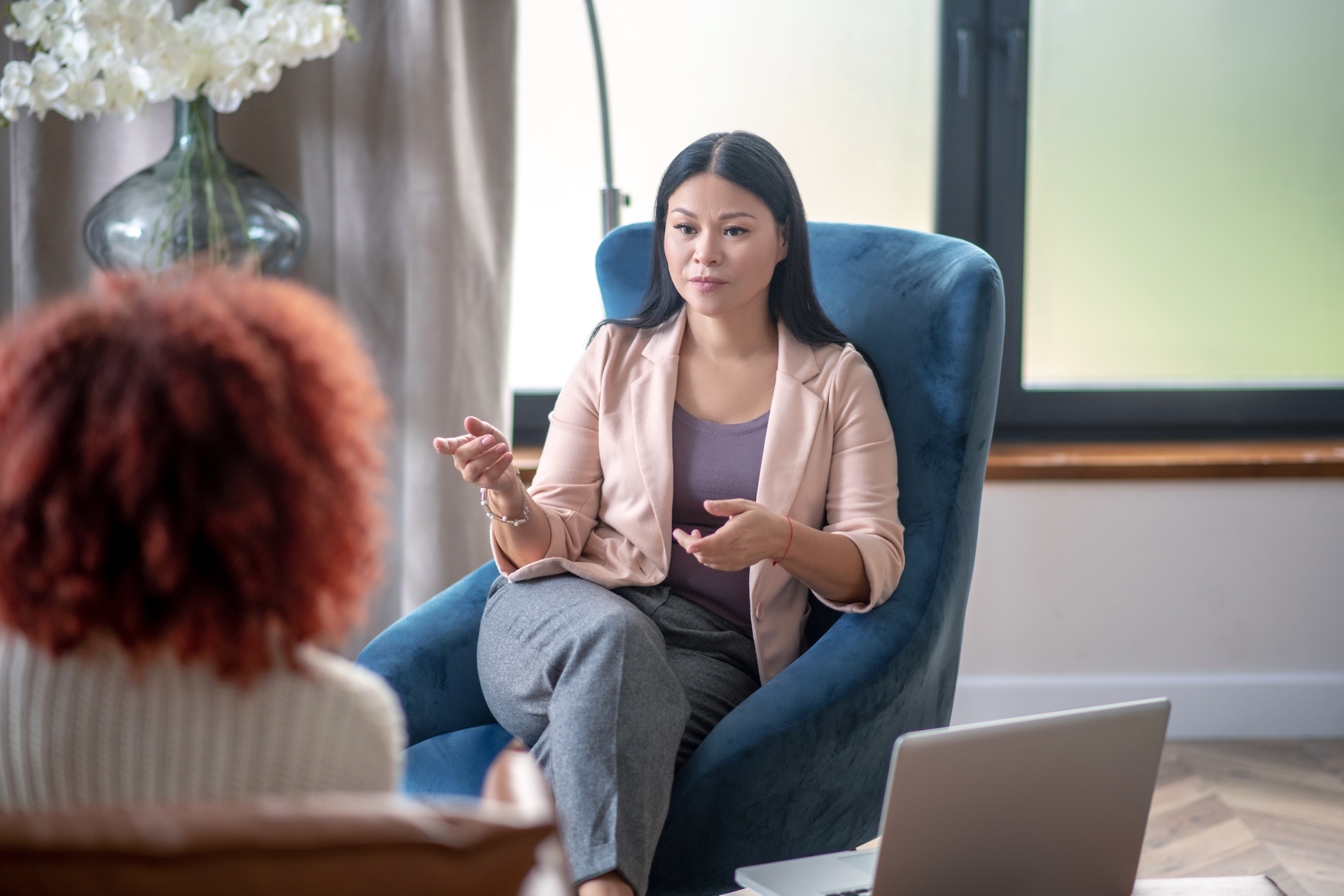 asian-professional-female-psychologist-speaking-wi-2024-10-17-15-16-52-utc