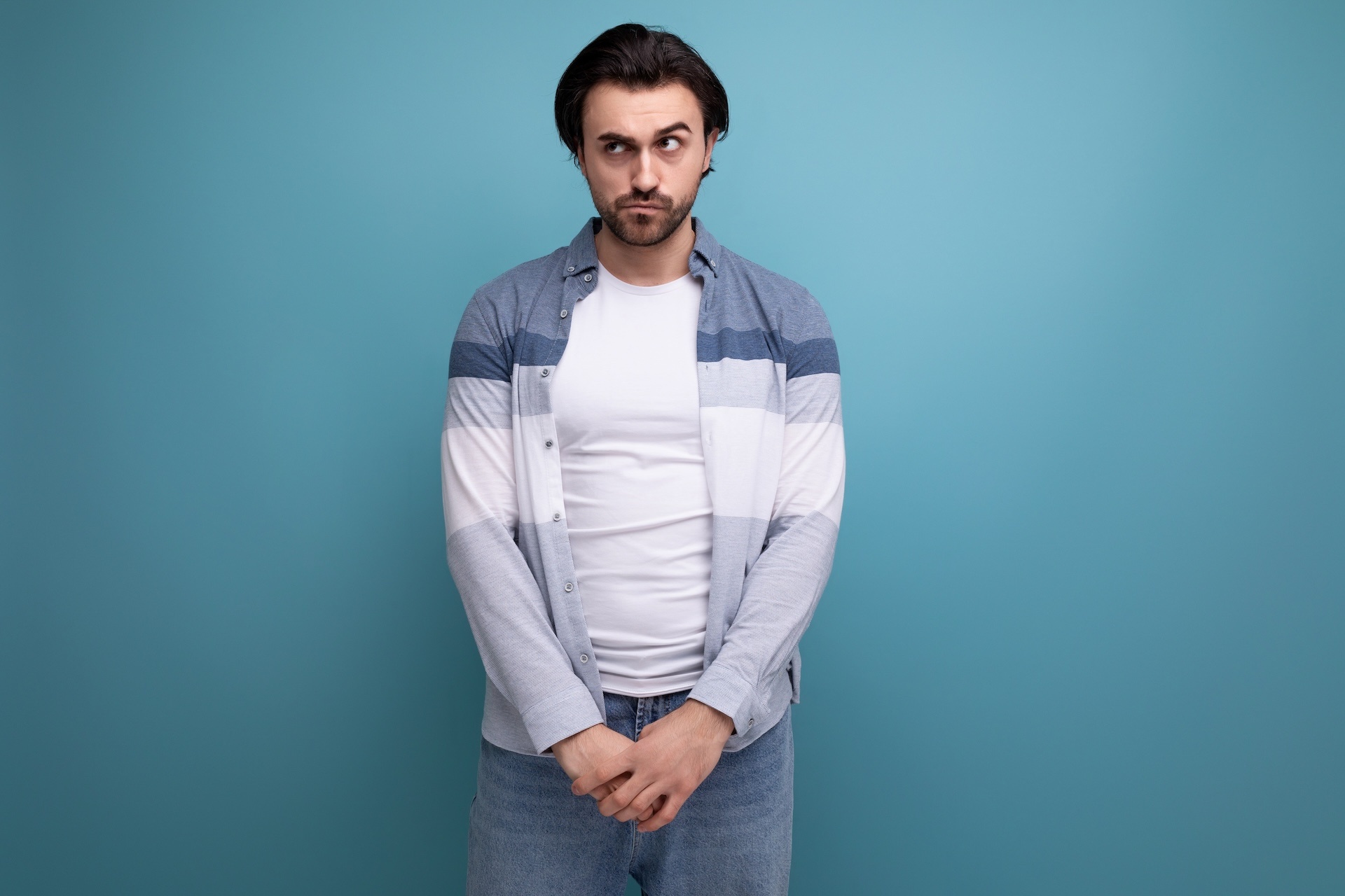 portrait-of-a-well-groomed-young-brunette-man-on-a-2023-11-27-05-14-01-utc