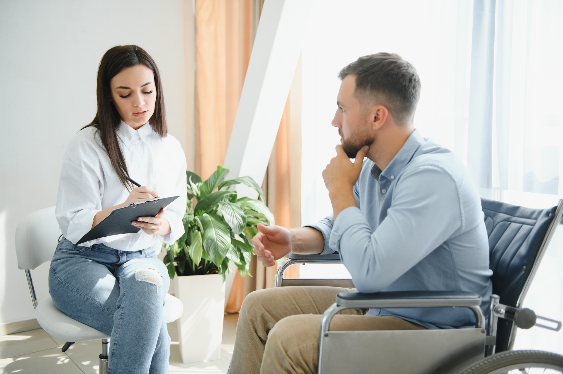 portrait-of-female-psychiatrist-interviewing-handi-2023-11-27-05-22-33-utc