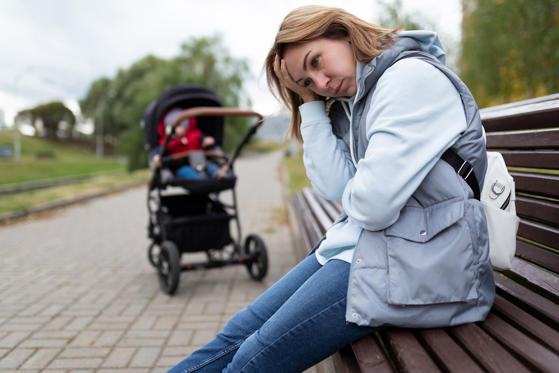 young-woman-mother-of-postpartum-depression-sits-w-2023-11-27-05-26-18-utc