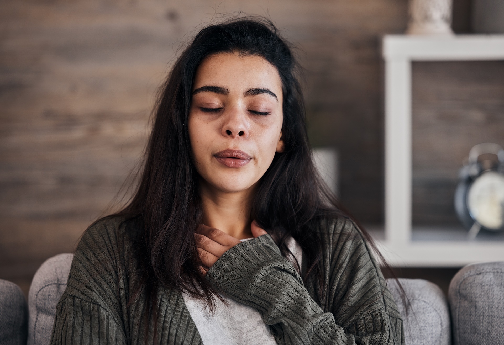 depression-sad-and-woman-with-eyes-closed-in-home-2025-04-06-01-10-12-utc
