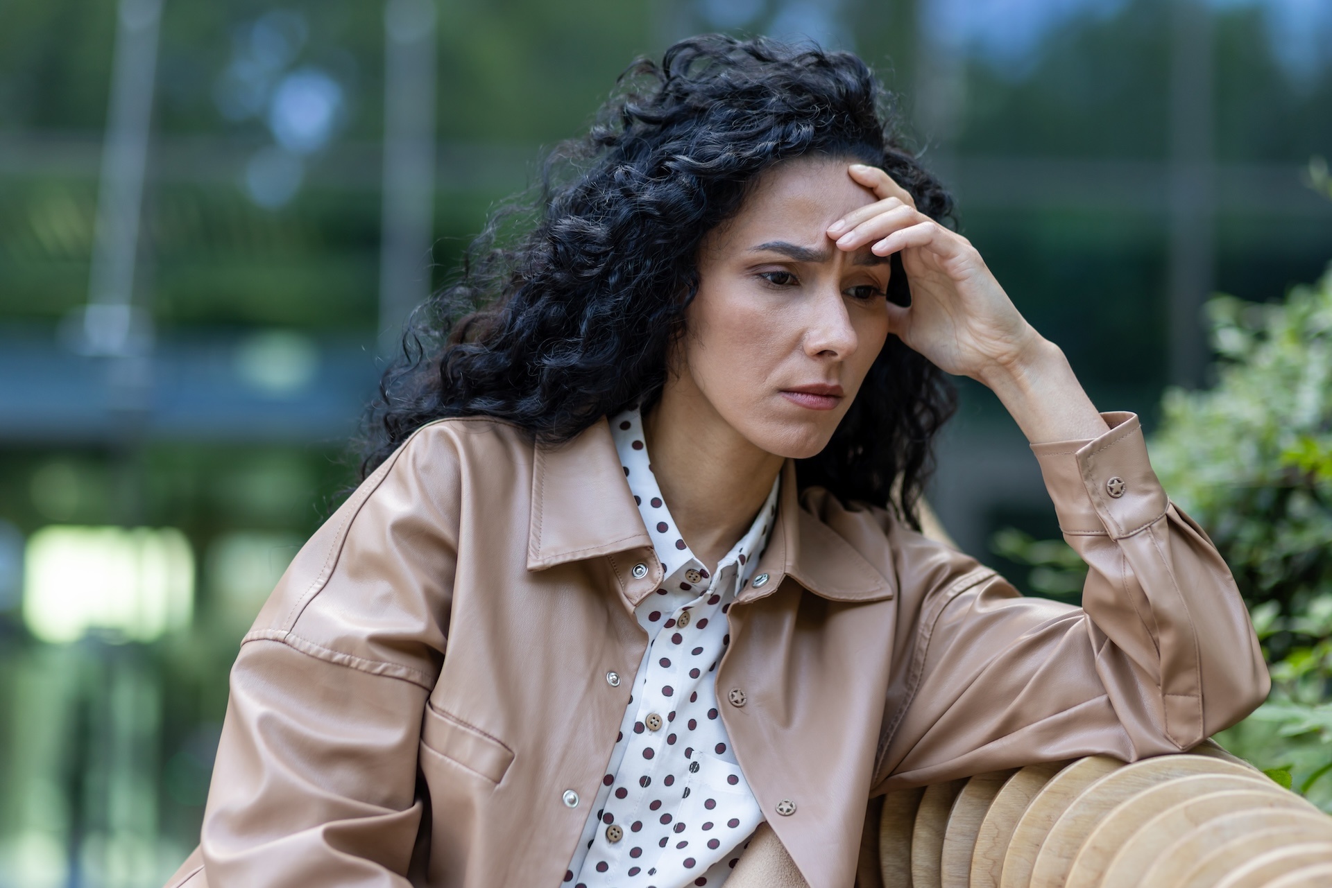 depressed-mature-adult-woman-sitting-on-bench-outs-2023-11-27-05-29-46-utc