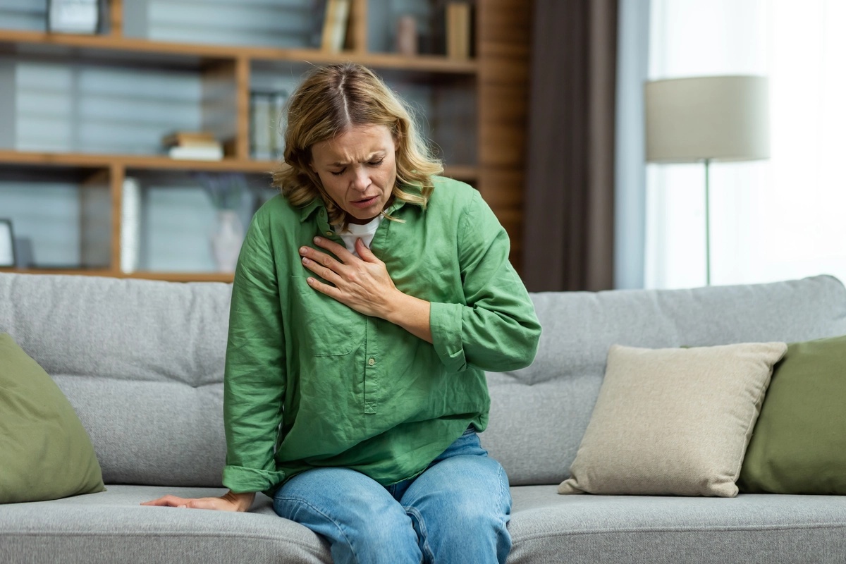 A woman suffering from the physical symptoms of inhalant addiction. A woman suffering from the physical symptoms of inhalant addiction.