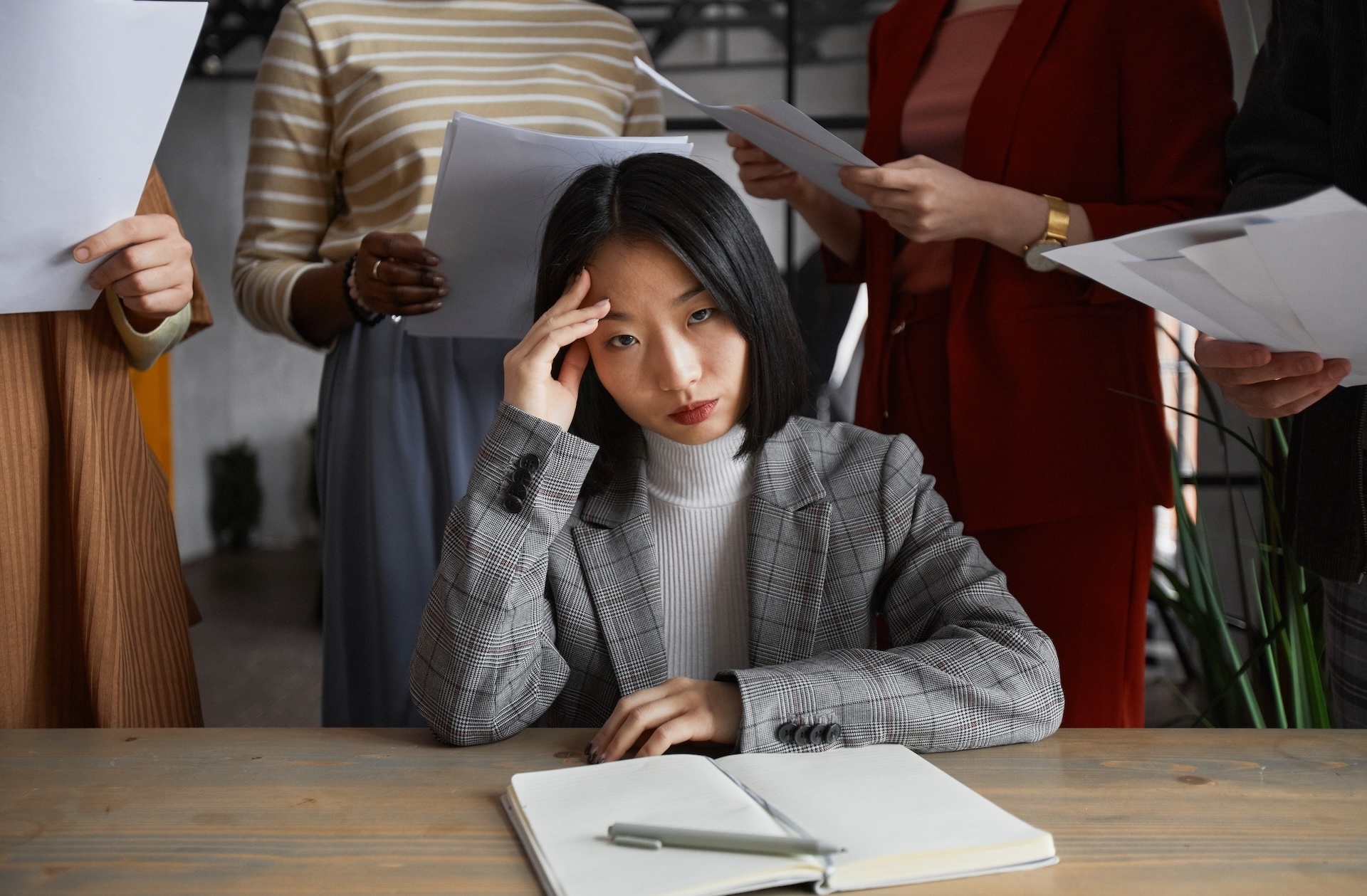 stressed-asian-businesswoman-at-work-2025-03-06-01-21-17-utc