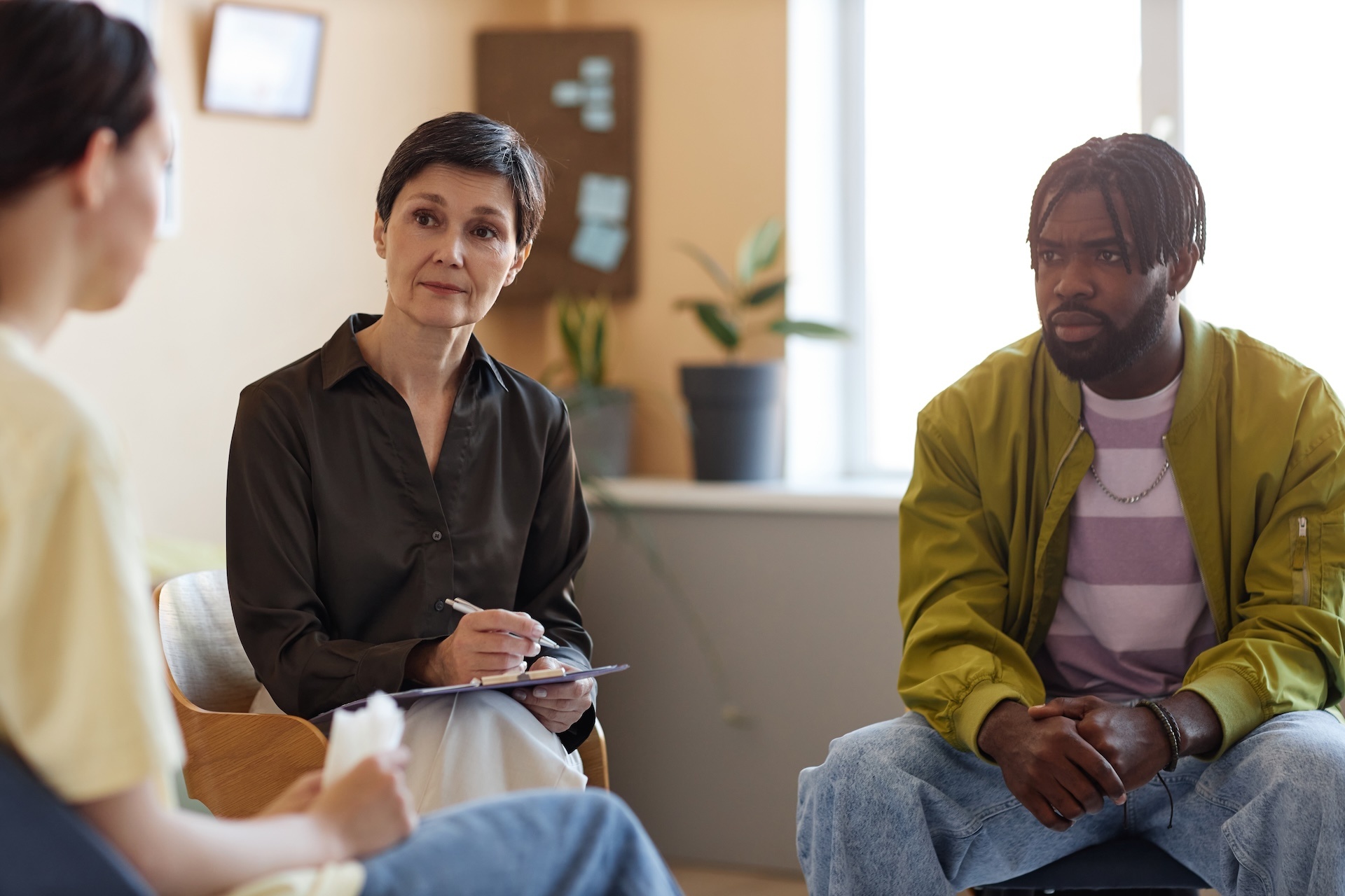 psychologist-working-with-people-at-session-2025-03-09-02-48-50-utc