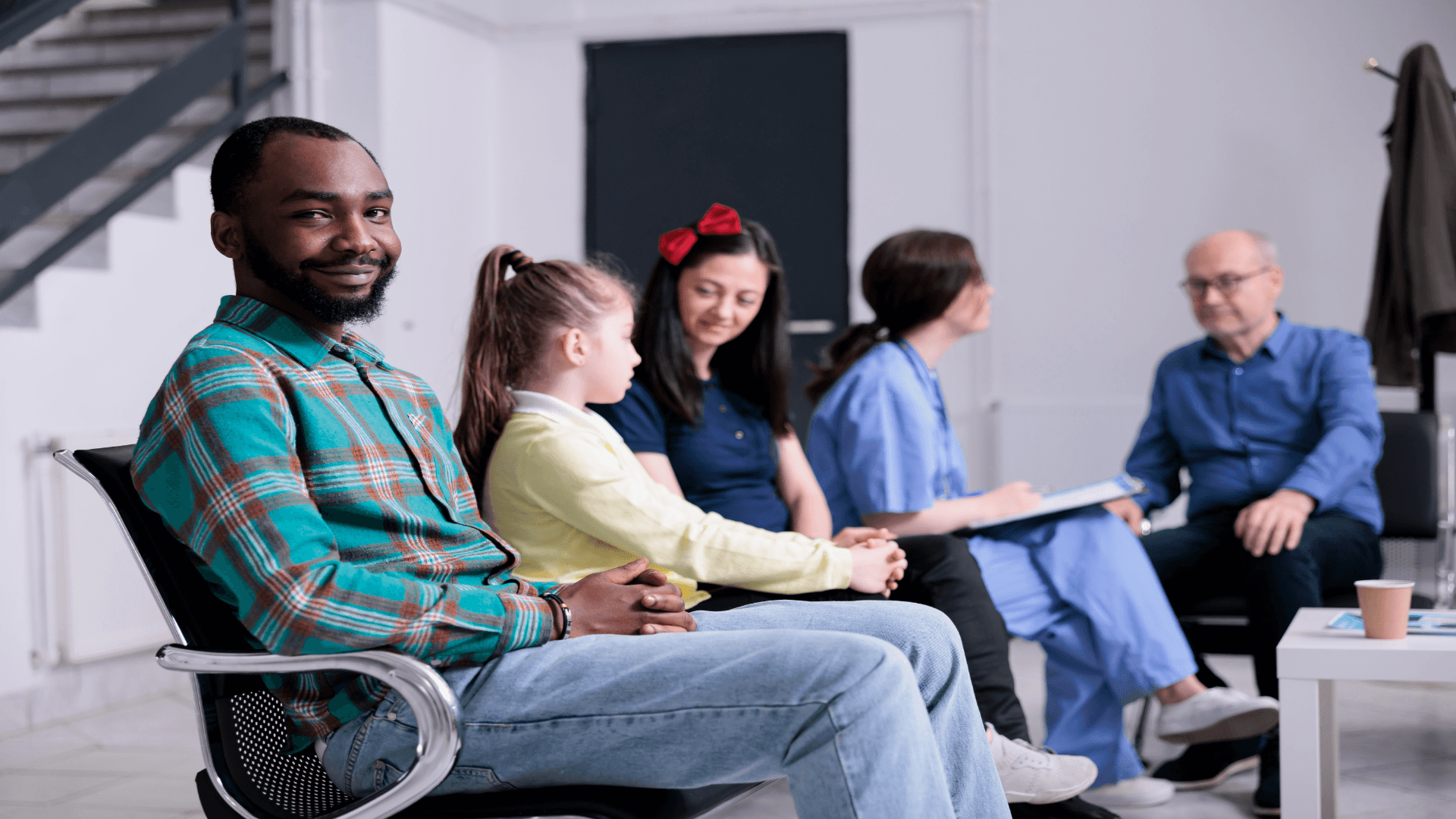 portrait-of-african-american-patient-smiling-at-ca-2023-11-27-05-09-43-utc