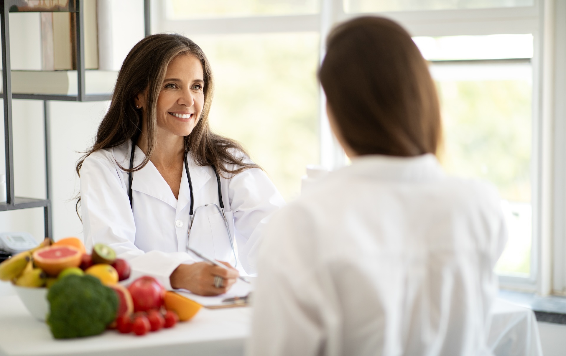 cheerful-european-middle-aged-doctor-nutritionist-2023-11-27-05-22-10-utc