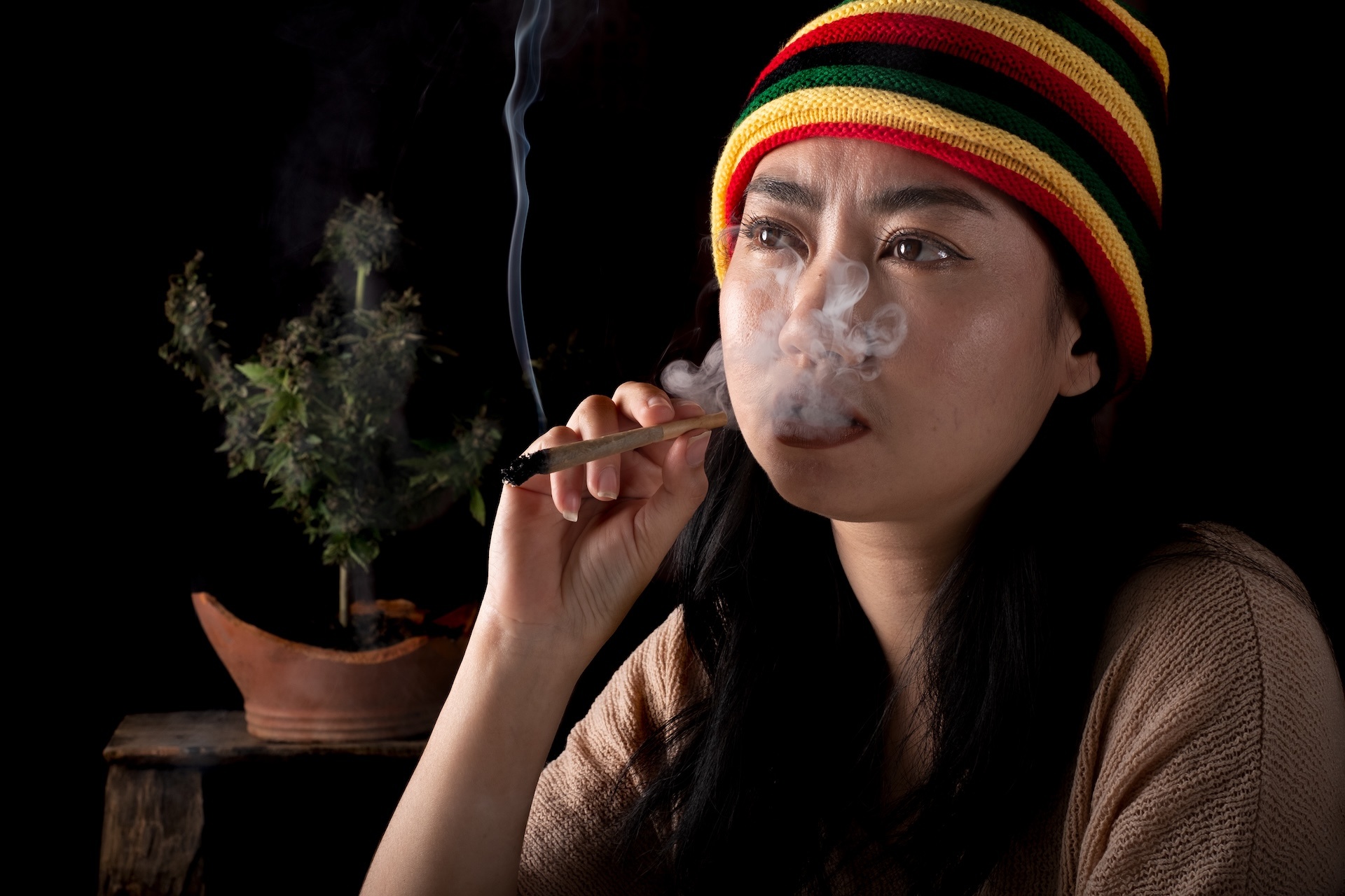 beautiful-asia-women-smoking-cigarettes-at-cannabi-2025-02-10-13-33-23-utc