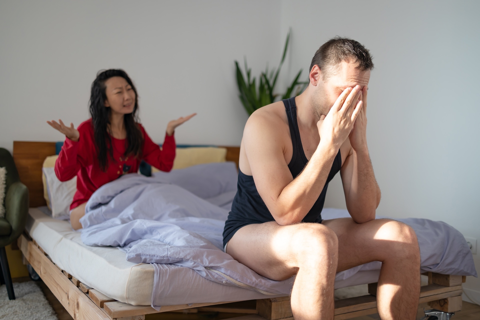 wife arguing with husband because of alcohol addiction