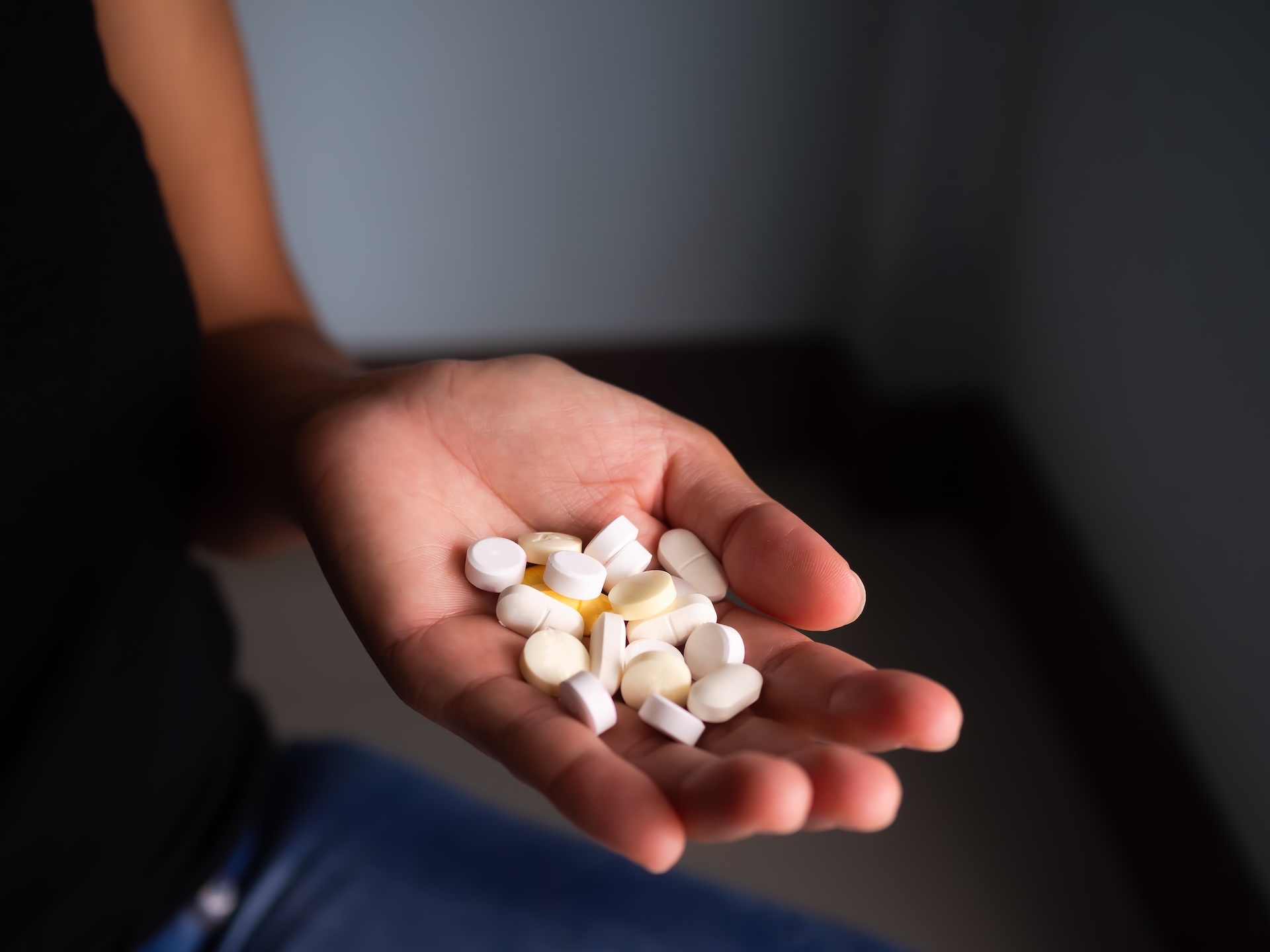 drug-on-palm-woman-on-dark-black-background-2023-11-27-05-08-37-utc