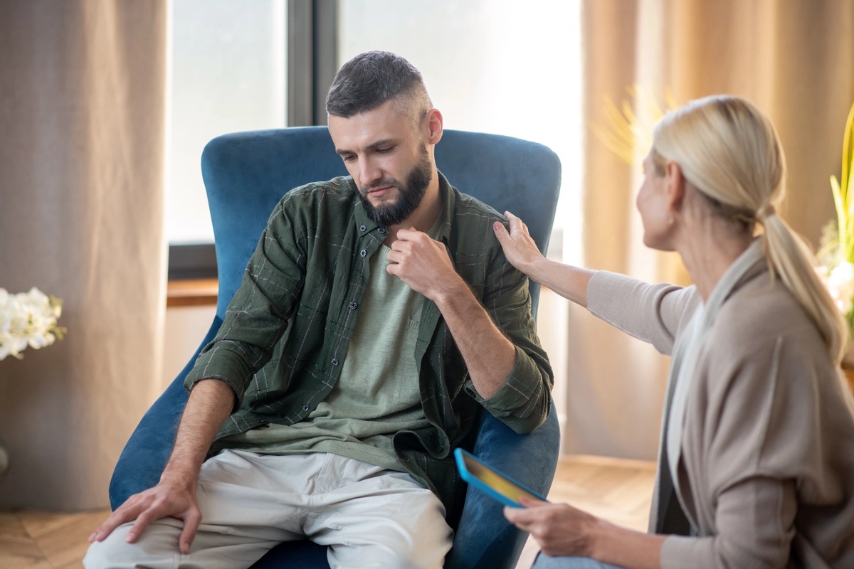 A man receiving therapeutic support for his marijuana addiction.