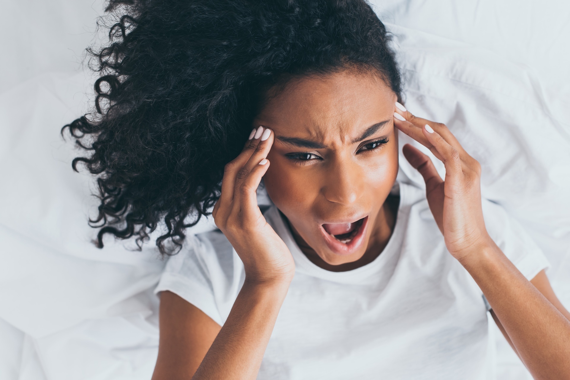 exhausted-african-american-woman-screaming-while-s-2024-11-18-22-51-16-utc