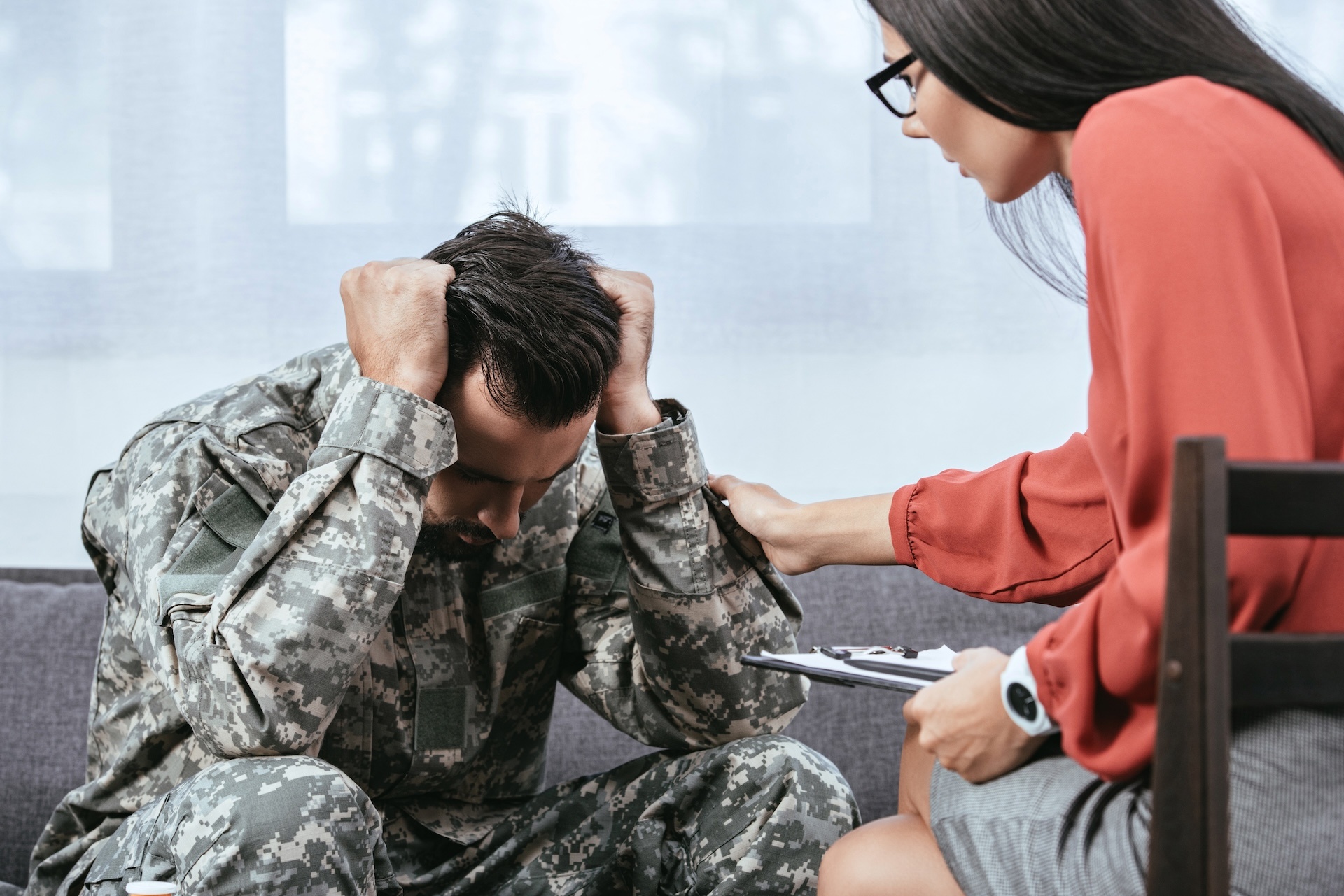 female-psychiatrist-supporting-soldier-with-post-t-2024-11-17-13-54-51-utc