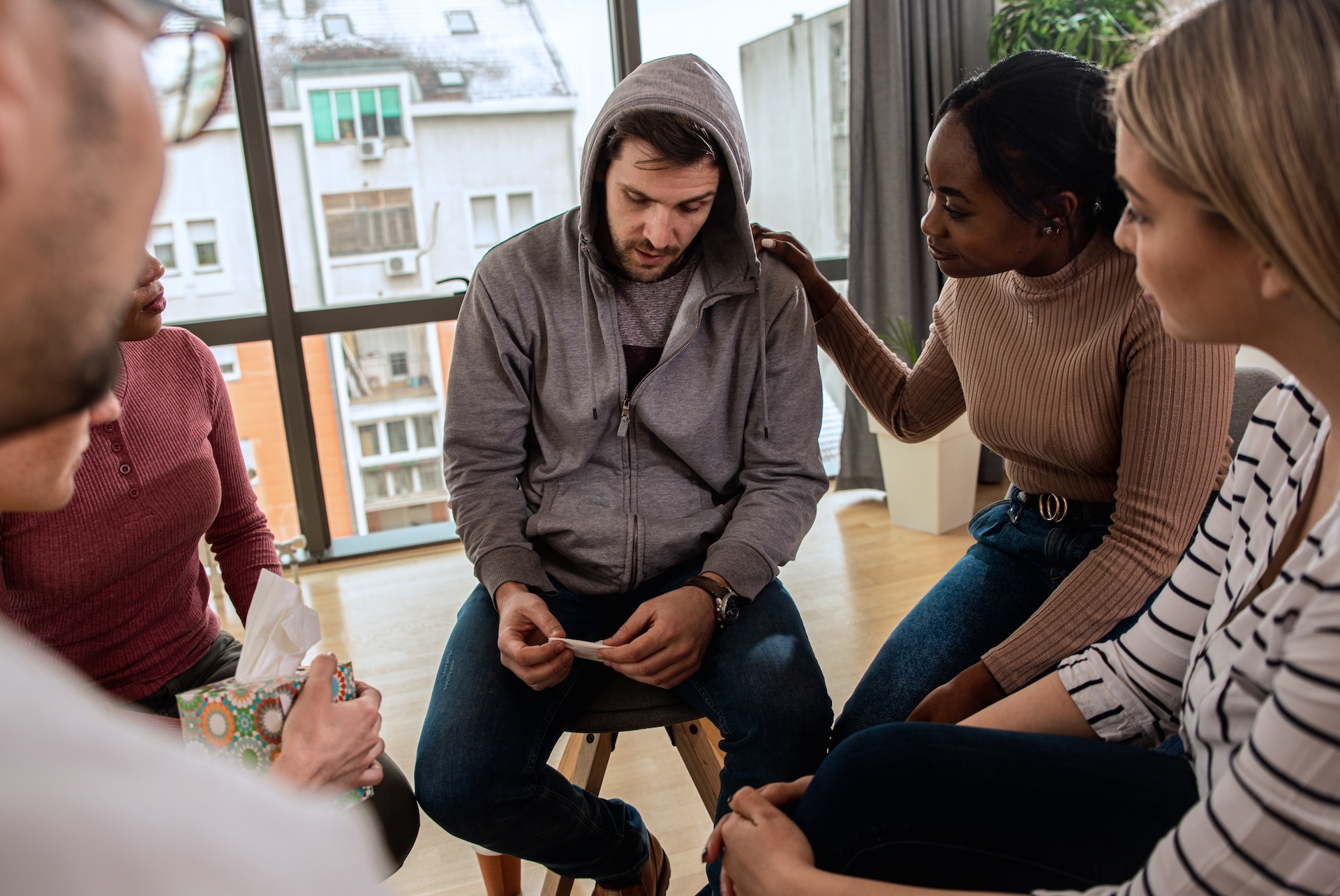 diverse-group-of-people-sitting-in-circle-in-group-2025-01-29-14-46-31-utc (1)
