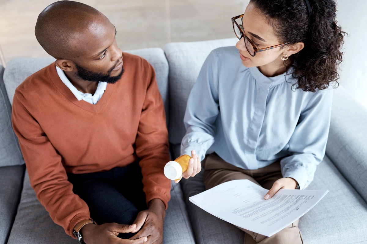A man consulting his healthcare provider for a treatment plan to overcome inhalant addiction.