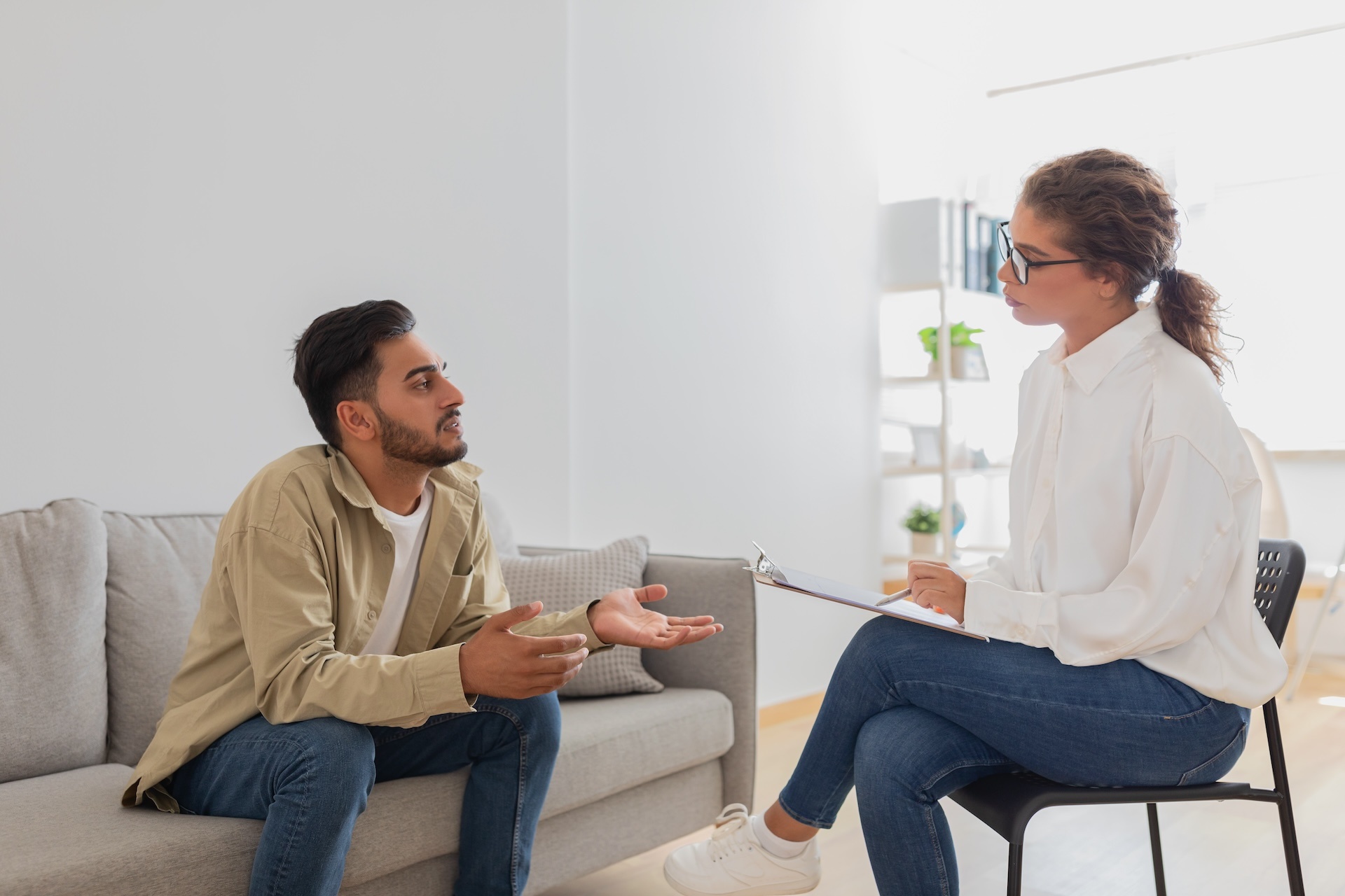 man-and-woman-in-a-therapy-session-2024-04-17-17-28-09-utc