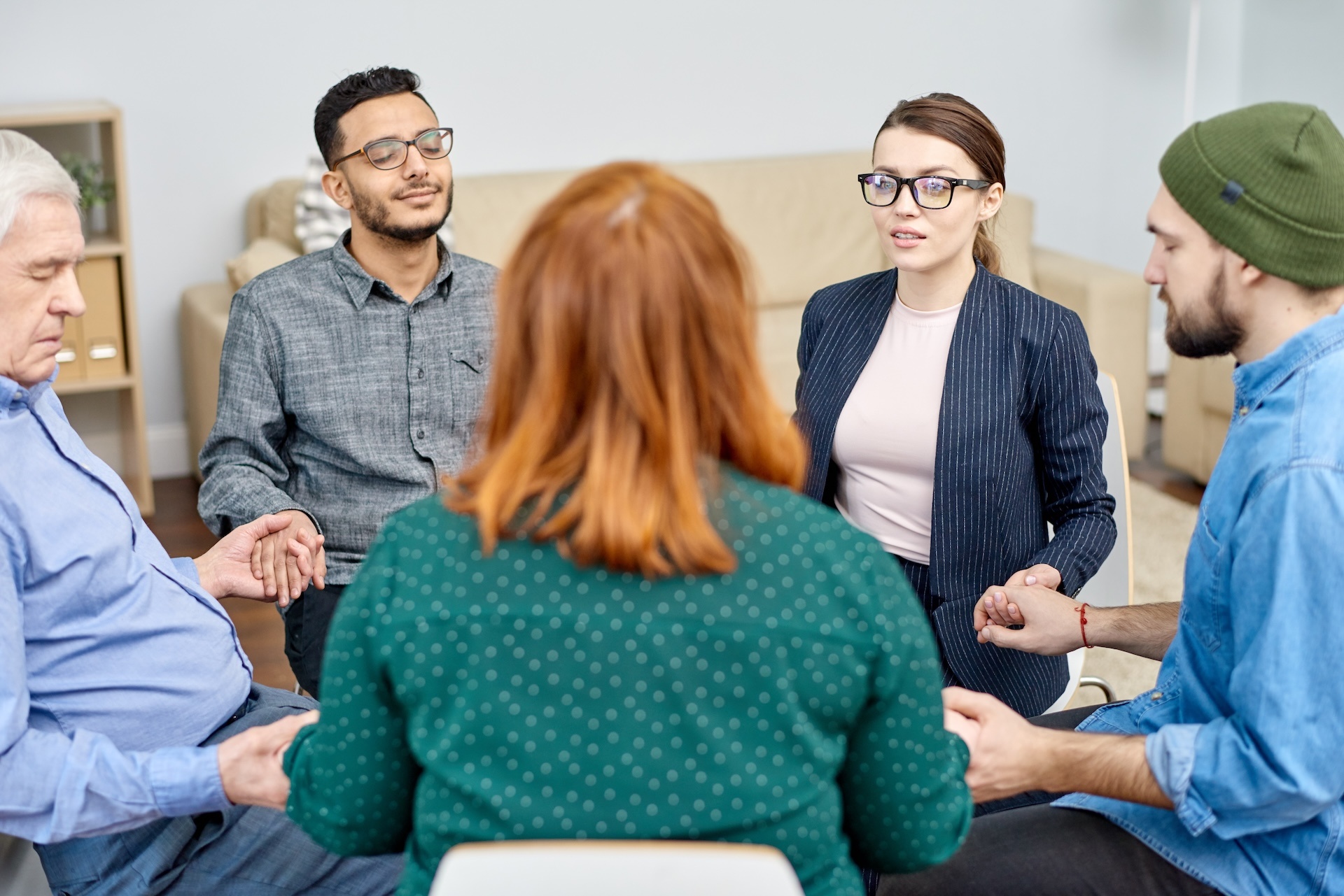 support-group-holding-hands-2023-11-27-04-58-34-utc