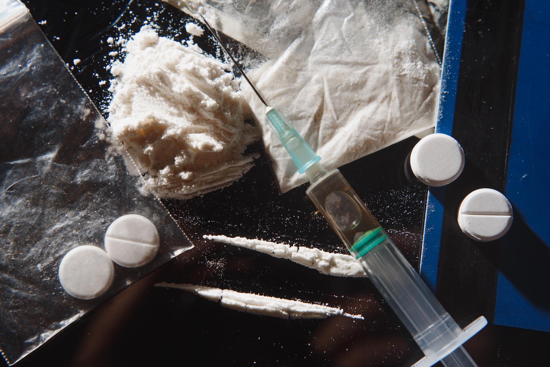 Heroin Detox: Heroin and drugs on table