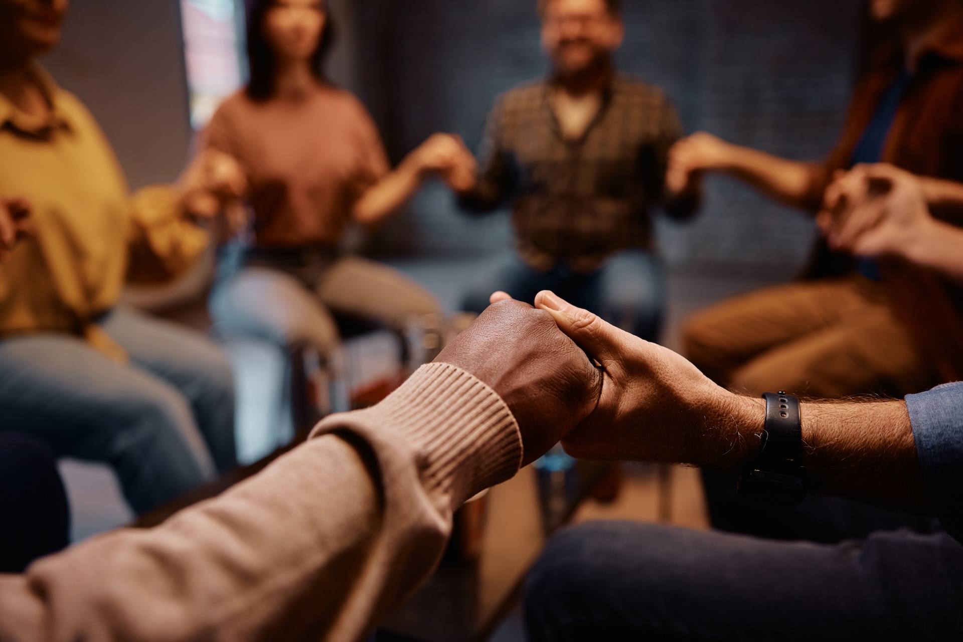 close-up-of-people-holding-hands-during-group-ther-2025-02-23-16-50-27-utc (1)